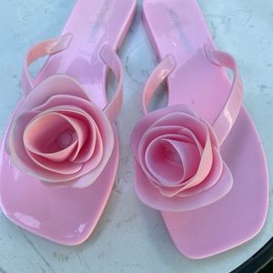 Baby pink plastic beach thongs with rose on top , preowned Jeffrey Campbell